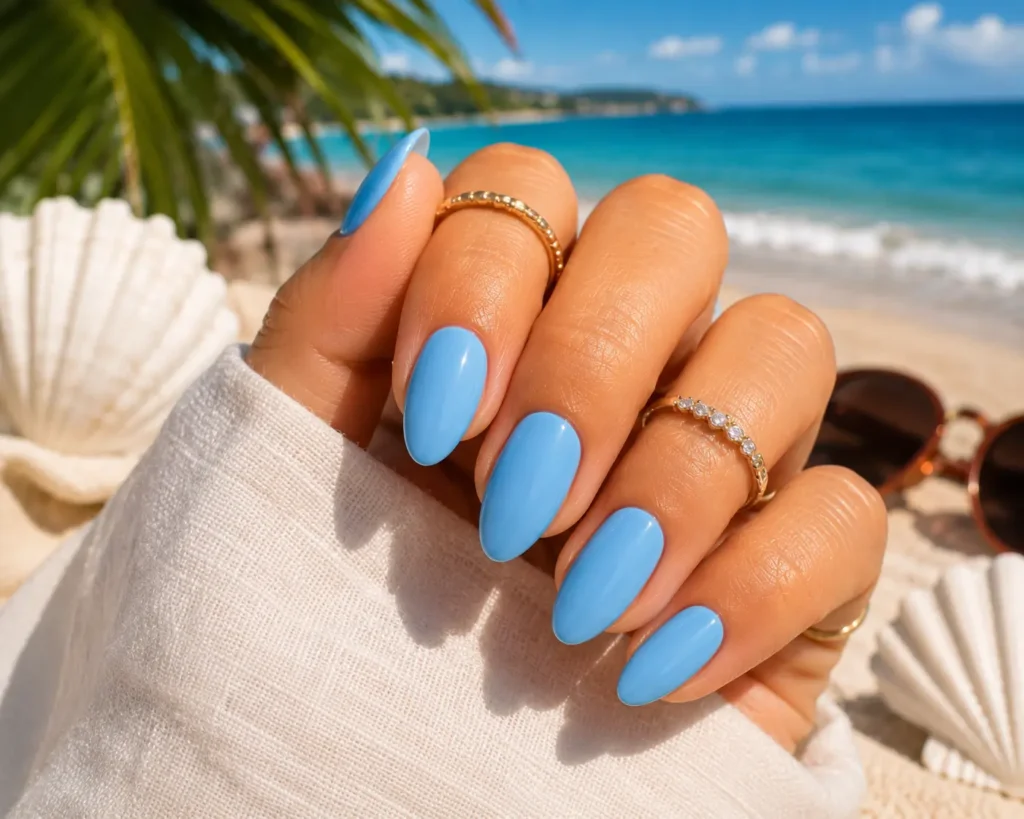 Sky blue summer nail trend 2026 with glossy finish.