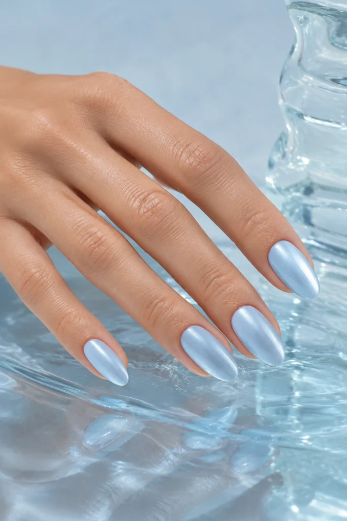 Icy blue pastel nails with a glossy summer finish